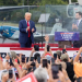 Trump realiza su primer mitin al aire libre, protegido por vidrio antibalas
