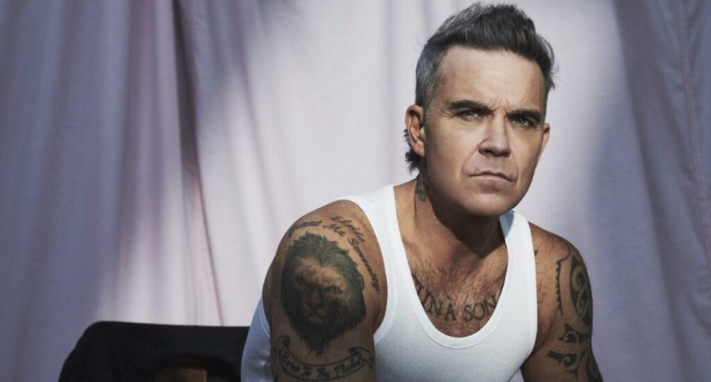 Robbie Williams lanzará Britpop, su nuevo álbum inspirado en los 90, en otoño de 2025. Incluye colaboración con Tony Iommi y una gira por Reino Unido y Europa.
